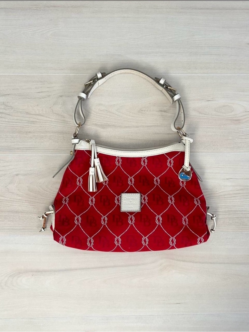 Dooney & Bourke Red Logo Jacquard Shoulder Bag with Cream Trim and Tassels